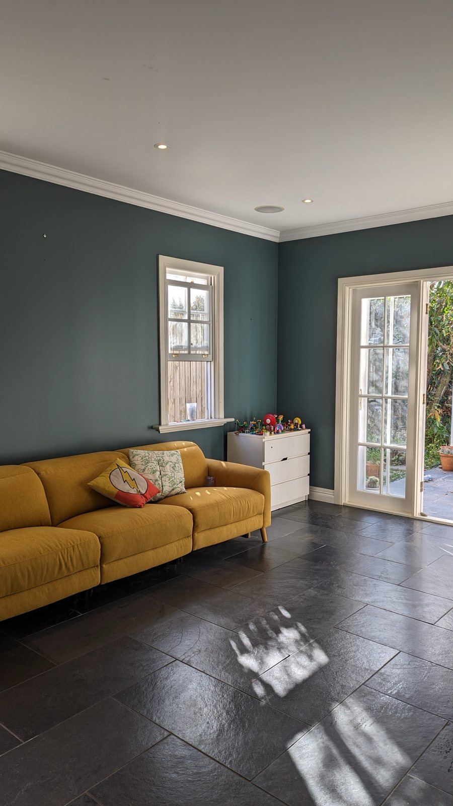 Interior painted with a teal feature wall