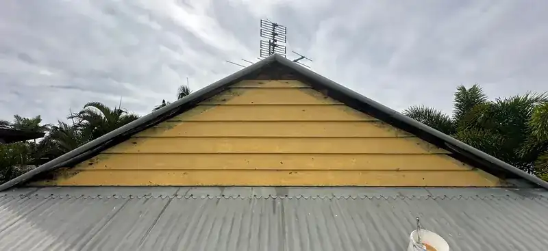 Gable repair and repaint, before