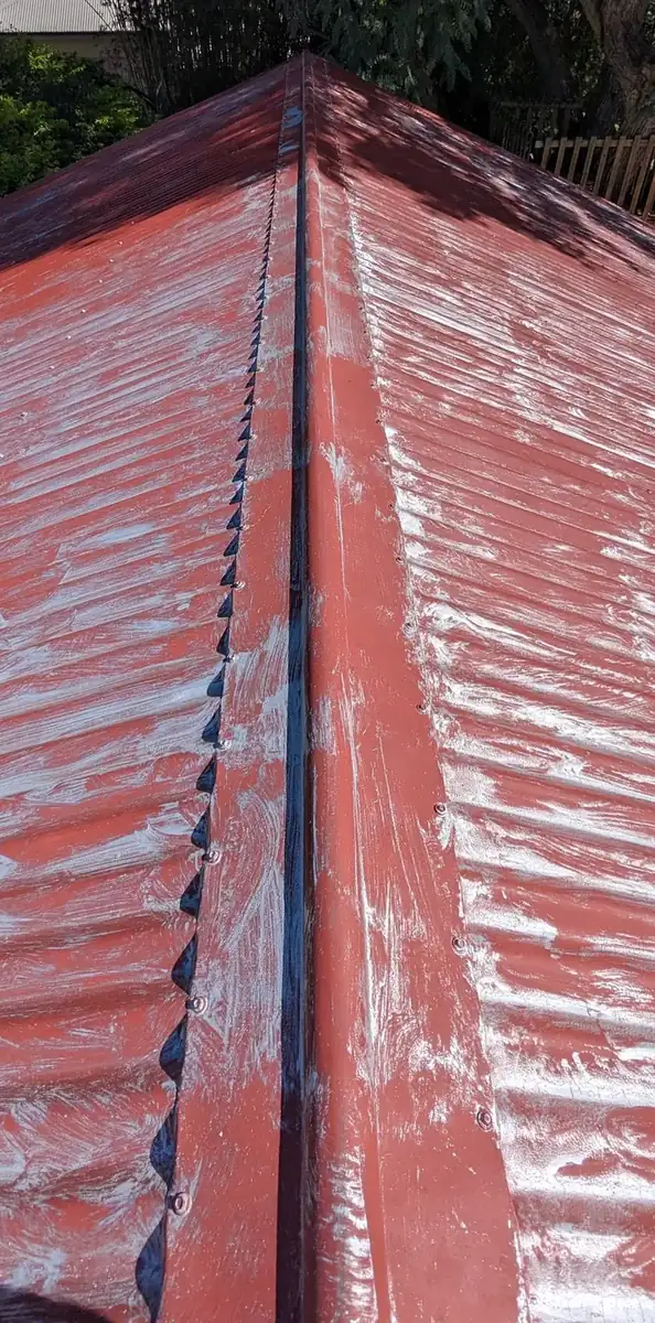 Roof respray, red to grey, before