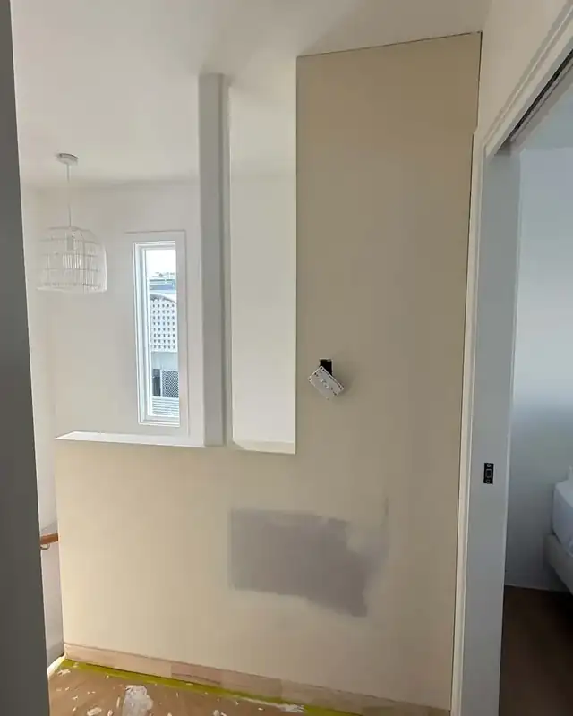 Stairwell plaster repair and repaint, before